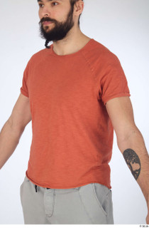 Turgen casual dressed orange t-shirt upper body 0002.jpg